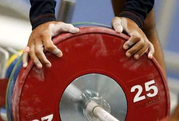 انصراف قهرمان المپیک از حضور در مسابقات جهانی وزنه برداری