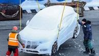 تصاویر دیدنی از جابجایی خودروهای یخ زده در روسیه 