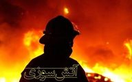 آتش‌سوزی هولناک در خیابان میرداماد | نجات 7 نفر از میان شعله‌های آتش
