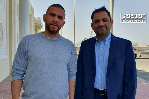 تصویری از دو زندانی ایرانیِ آزاده شده در دوحه

