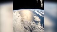 نمایی از اقیانوس آرام و انعکاس نور خورشید از زاویه ایستگاه فضایی بین المللی+فیلم
