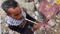 فلوت‌نوازی غم‌انگیز یک فلسطینی روی خرابه‌های خانه‌اش+فیلم