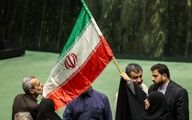 «دور افتخار» نمایندگان مجلس با پرچم ایران در صحن علنی! + عکس